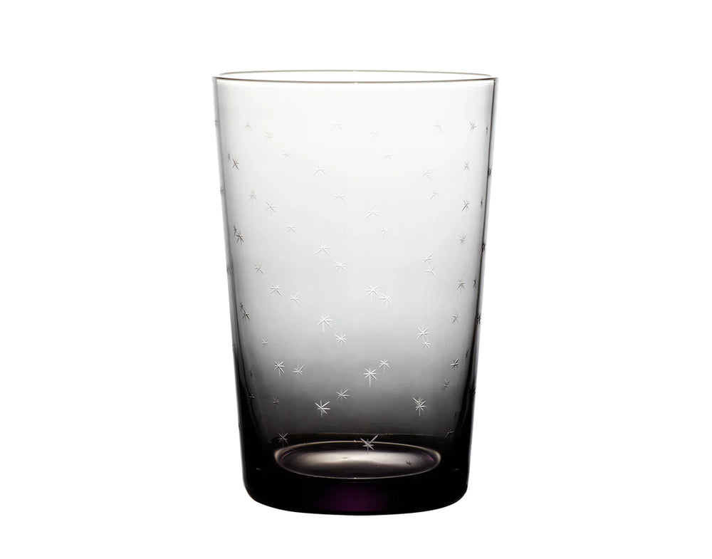 Front view of smoky tumbler showcasing hand-engraved star pattern and smoky gradient on white background