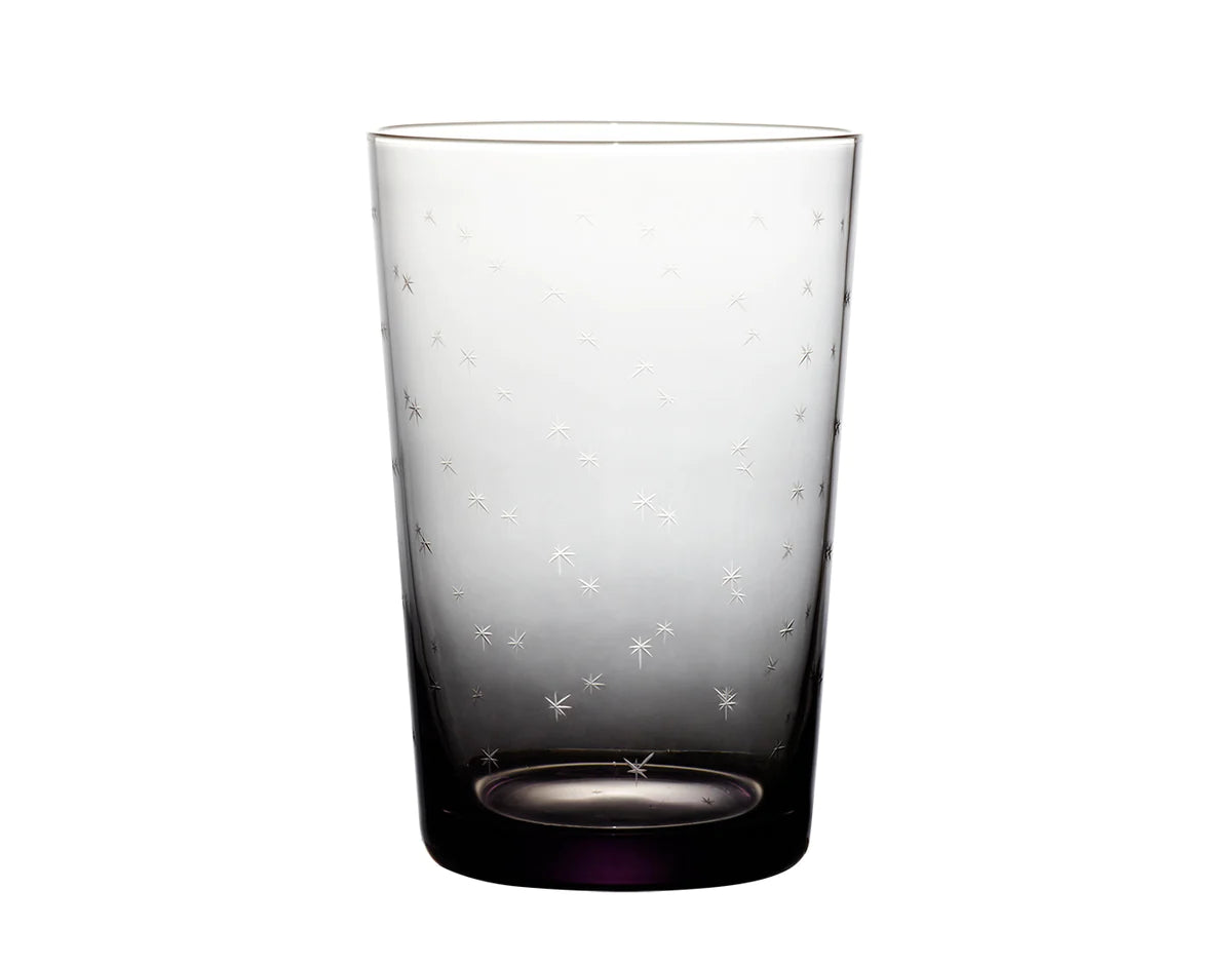 Front view of smoky tumbler showcasing hand-engraved star pattern and smoky gradient on white background