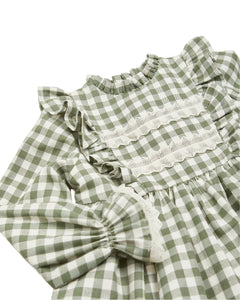 Green checkered dress with ruffled sleeves on a white background