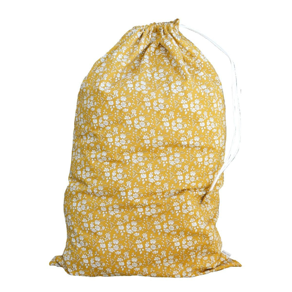 Front view of Storage Sack in Liberty Fabric Capel Mustard showcasing floral Tana Lawn cotton and ribbon drawstring on white background