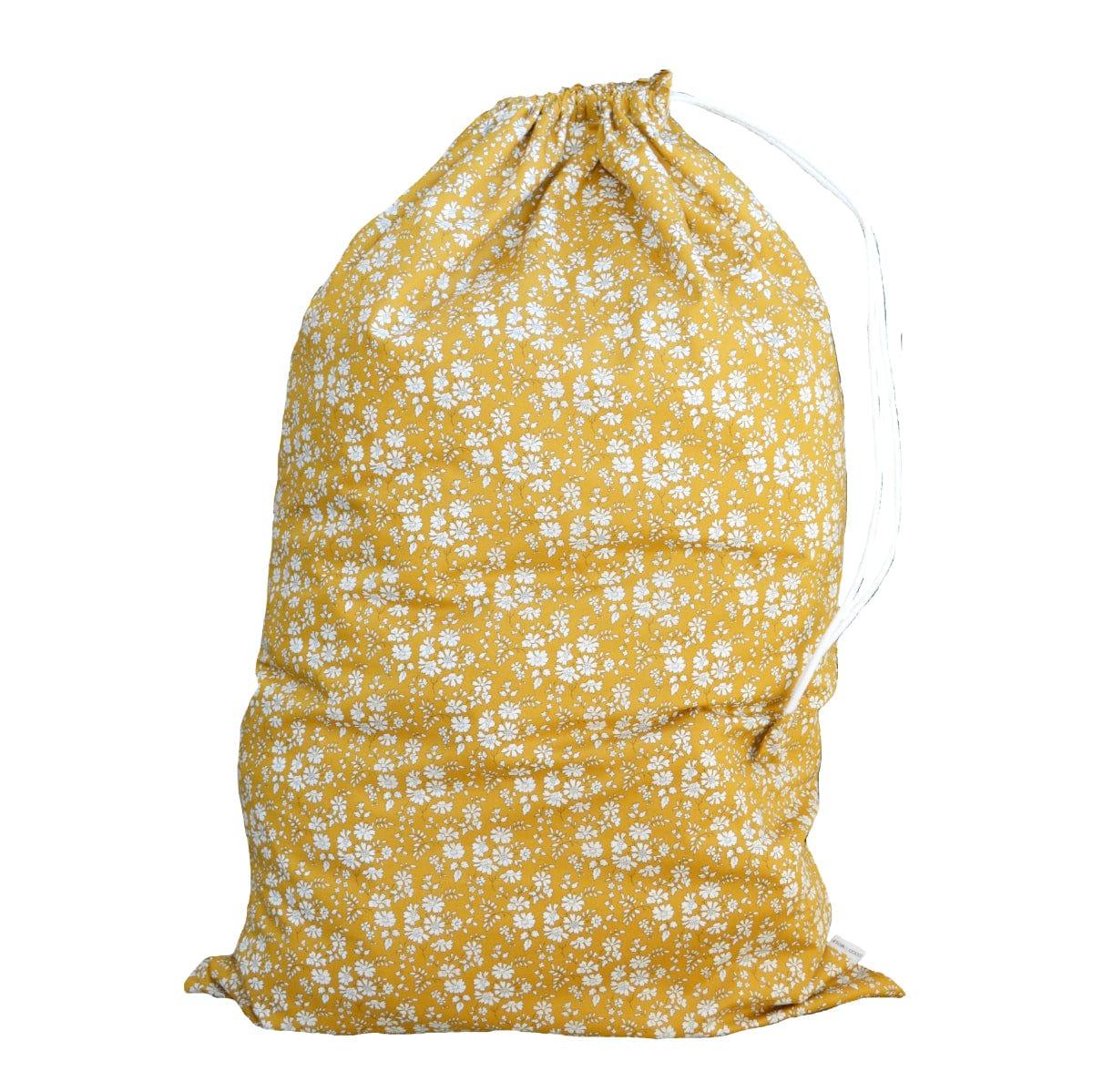 Front view of Storage Sack in Liberty Fabric Capel Mustard showcasing floral Tana Lawn cotton and ribbon drawstring on white background