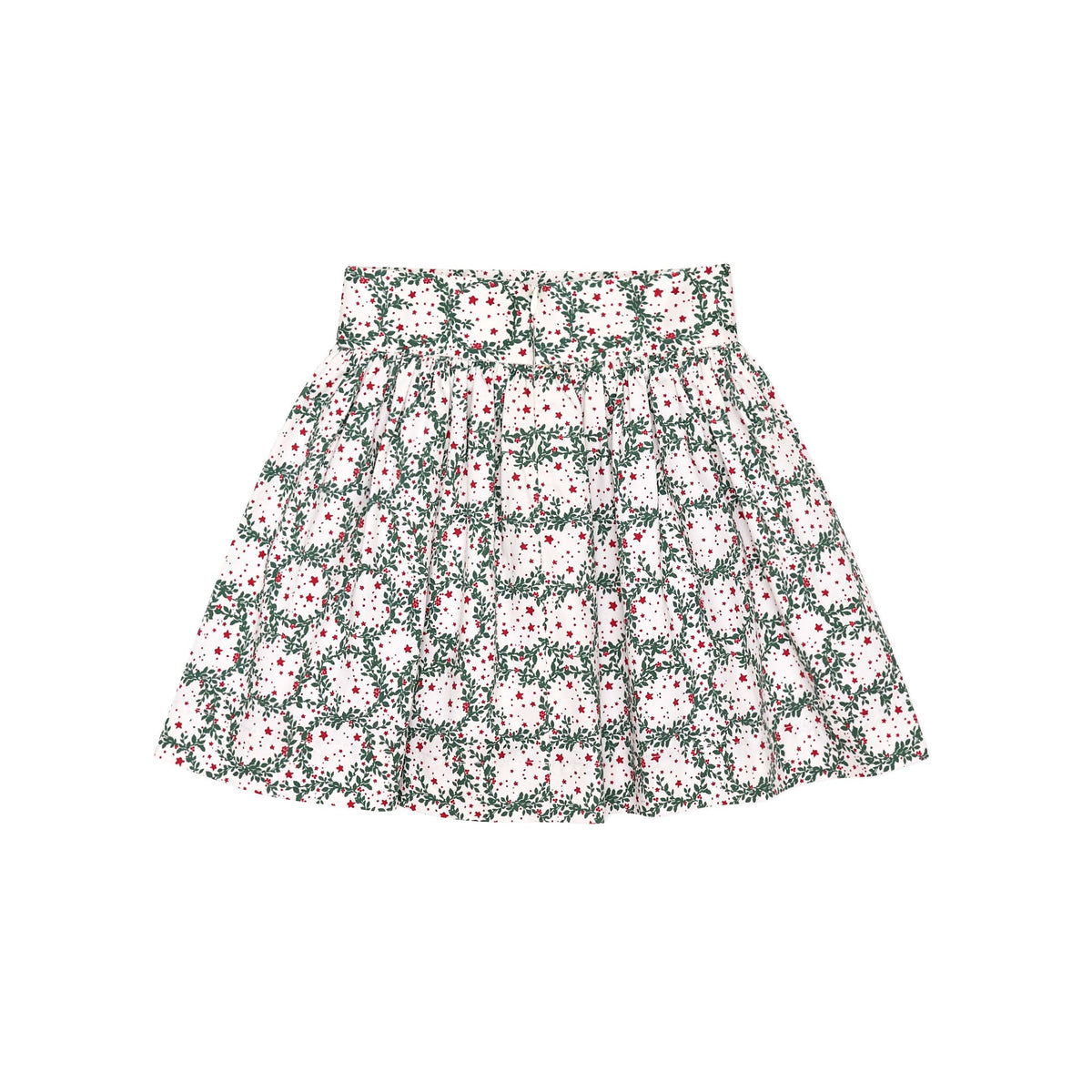 Girls’ Sutton Skirt in Regent Wreaths, featuring a festive green wreath and red star print on white with a full gathered silhouette.