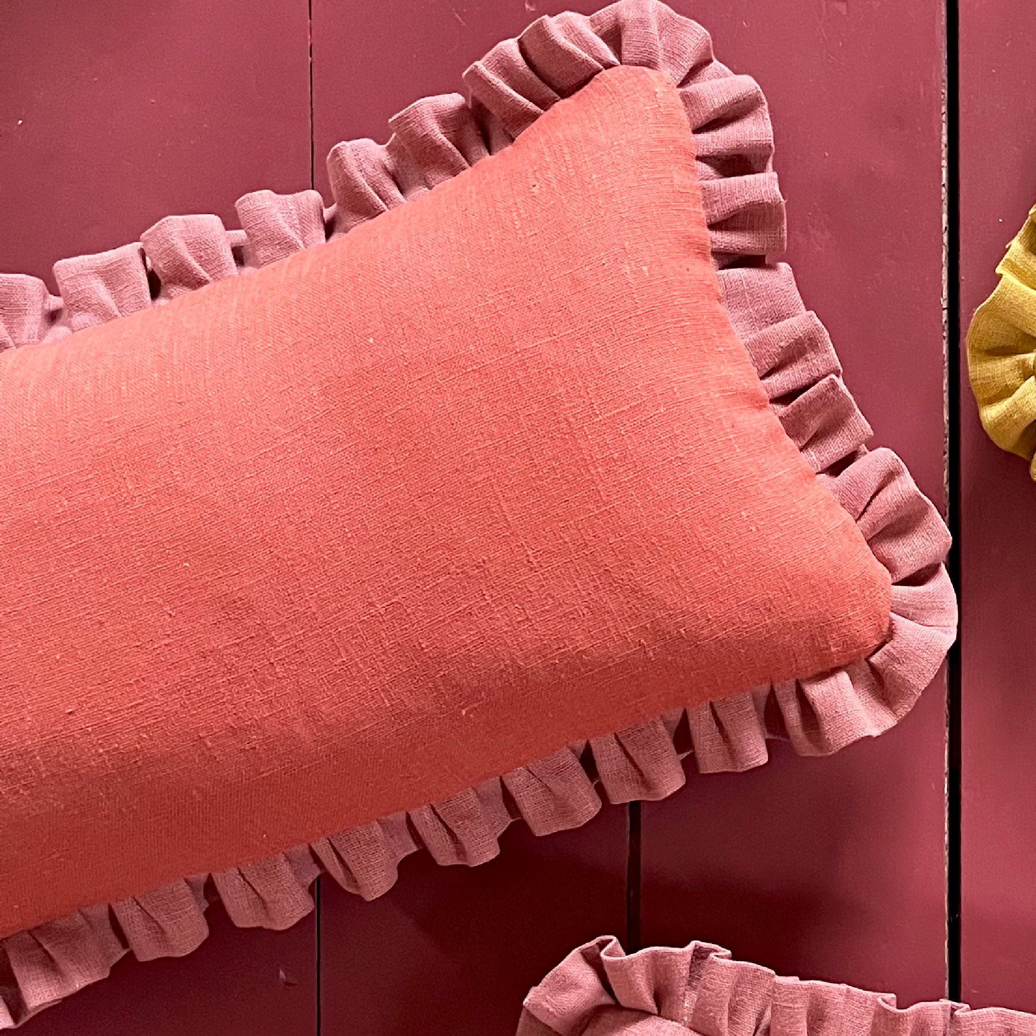 terracotta colour cushion with sirin terracotta frill 