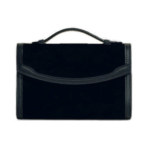 Front view of black suede top handle clutch showcasing sculpted leather trim on a white background
