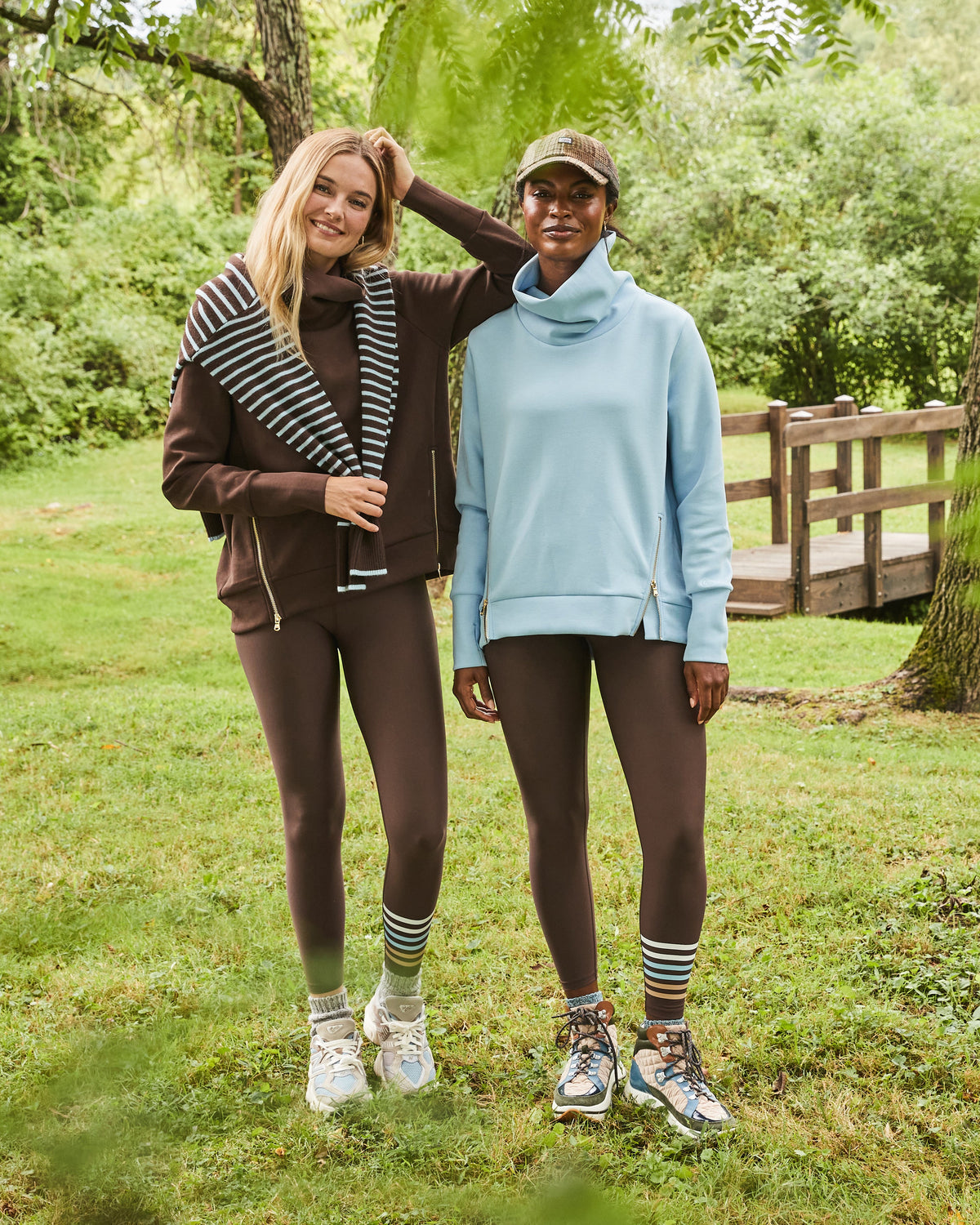 Model is wearing the Everyday Pullover in Baby Blue with the Chestnut Legging in Black