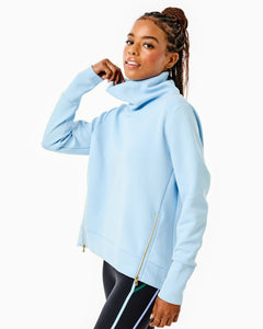 Model is wearing the Everyday Pullover in Baby Blue with the Chestnut Legging in Black