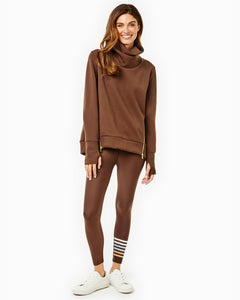 Model is wearing the Everyday Pullover in Chocolate with the Everyday Legging in Chocolate