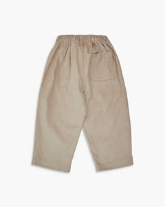 Beige pants on a white background