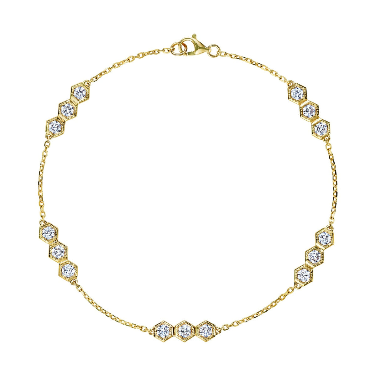 The Serpentine Station Bracelet with Hexagon Diamond Trios is an 18k gold bracelet featuring small hexagonal clusters of round brilliant diamonds, evenly spaced along a fine chain with a lobster claw clasp.