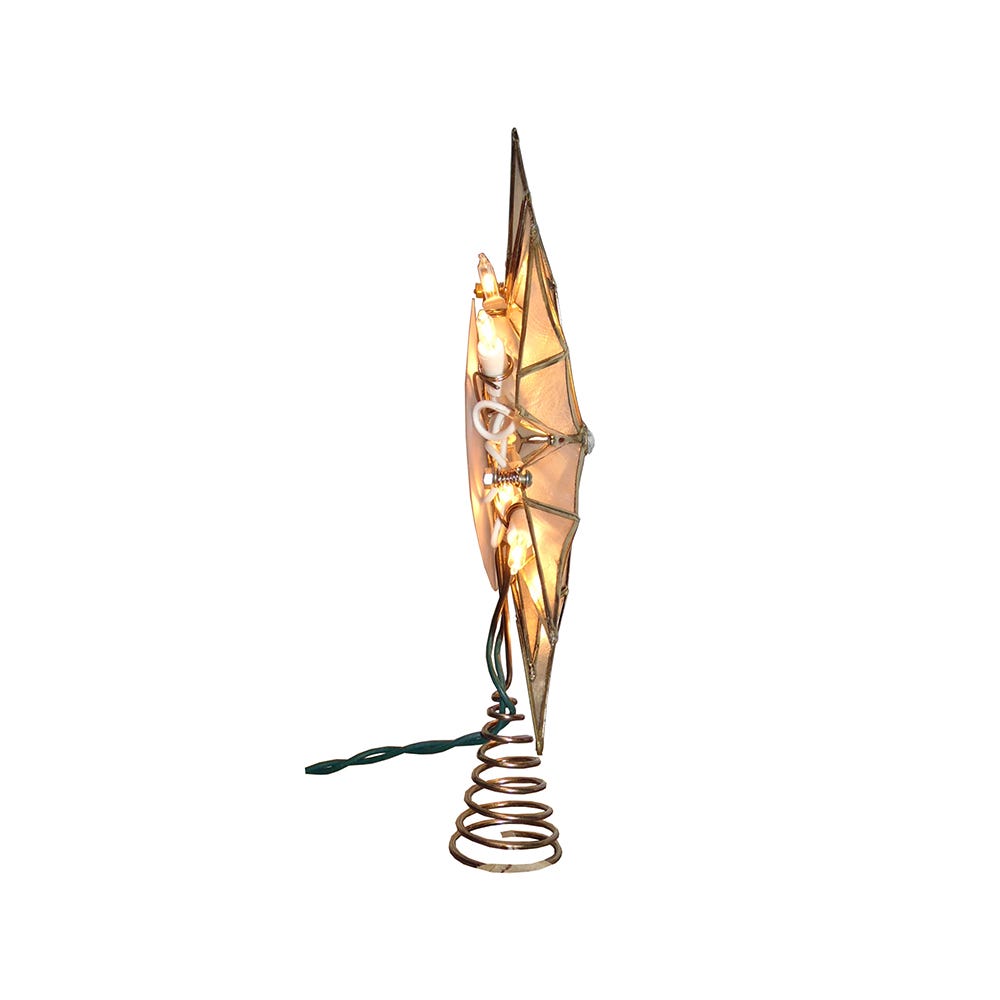 Side view of Capiz Star and Center Gem Treetop showcasing lit 12-point capiz star and twisted wire base on white background