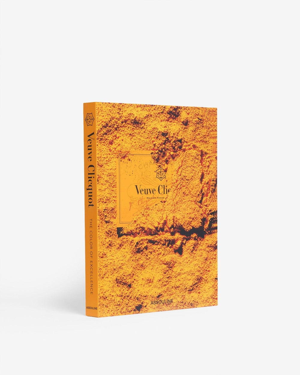 Three quarter view of Veuve Clicquot hardcover book showcasing orange cover with Veuve Clicquot logo on white background