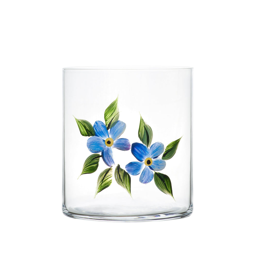 Front view of Forget Me Not crystal tumbler showcasing hand painted blue forget me not flowers and green leaves on a white background