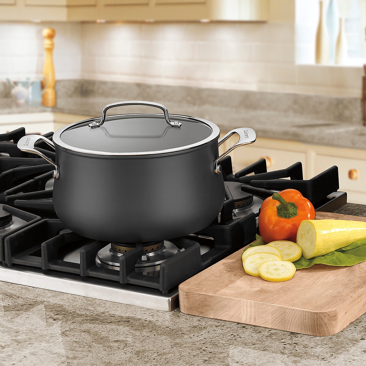 Front view of black 5 Quart Dutch Oven with Cover showcasing side handles and glass lid on a stovetop