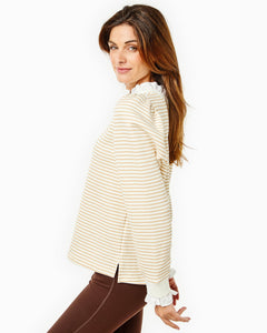 Model is wearing the Ziggy Top in Cream/ Camel Stripe with the University Flare Pants in Chocolate