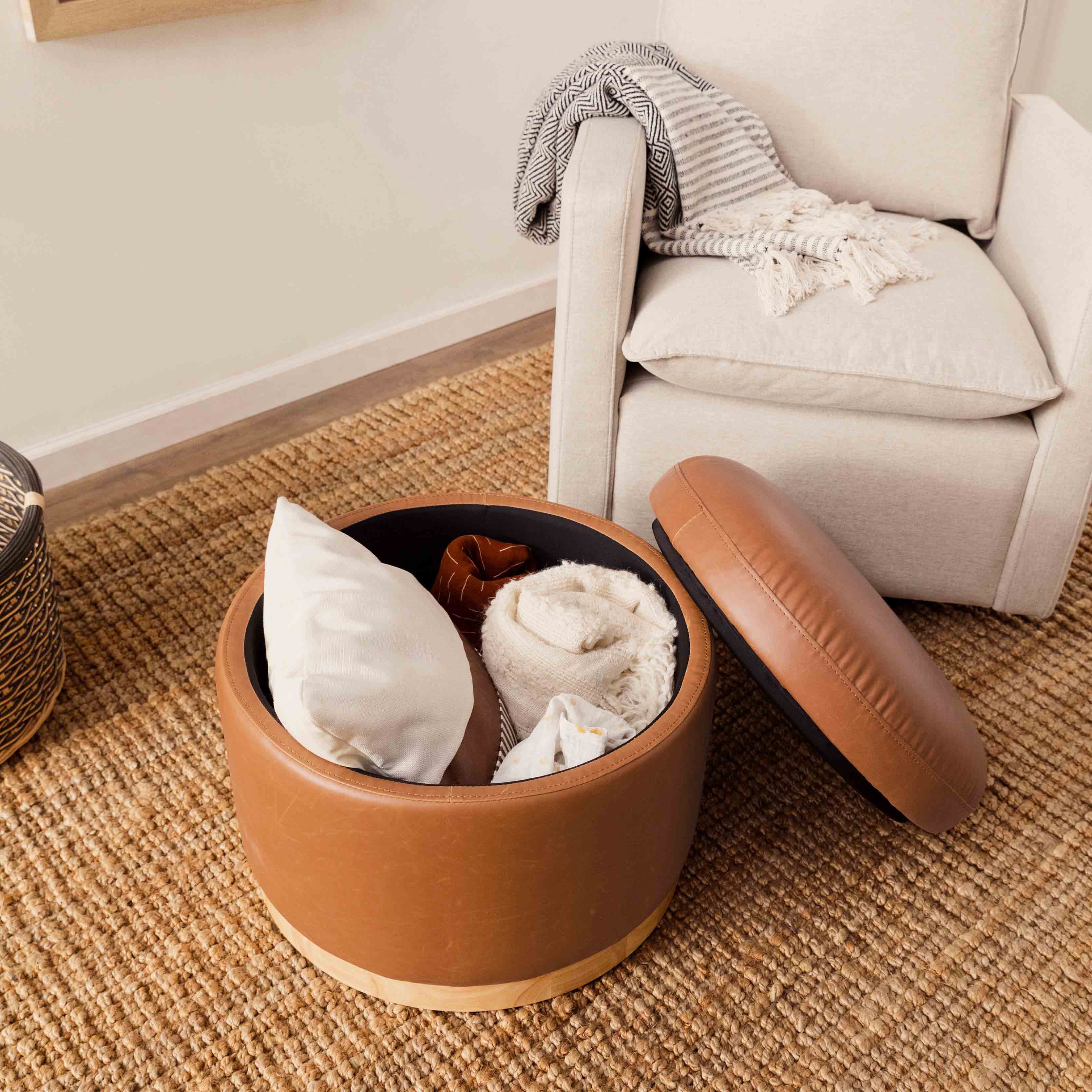 Naka Storage Ottoman in Vegan Leather in Vegan Tan Leather with Light Wood Base