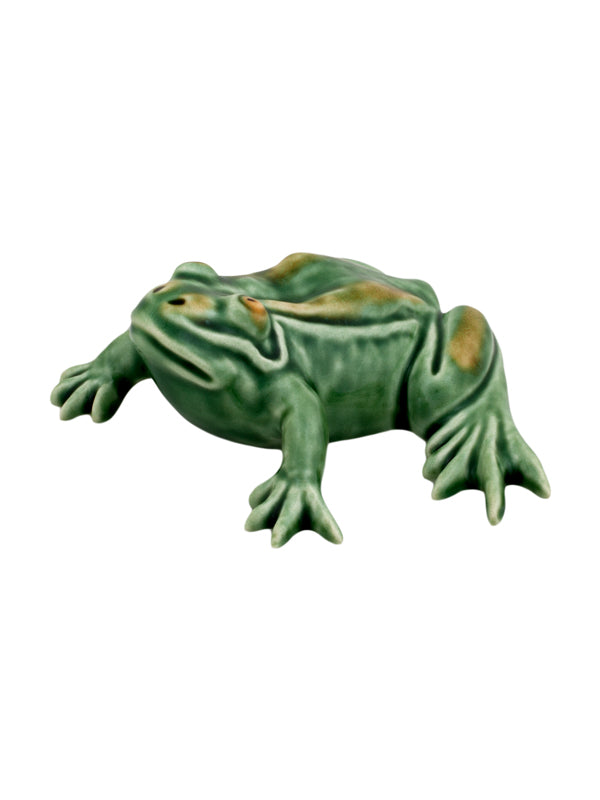 Side view of Frogs Small Frog showcasing a green earthenware frog sculpture on a white background