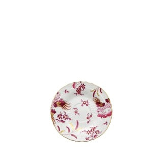 Top view of Oro Di Doccia coffee saucer showcasing magenta rooster and floral hatchings on white porcelain with gold rim on white background
