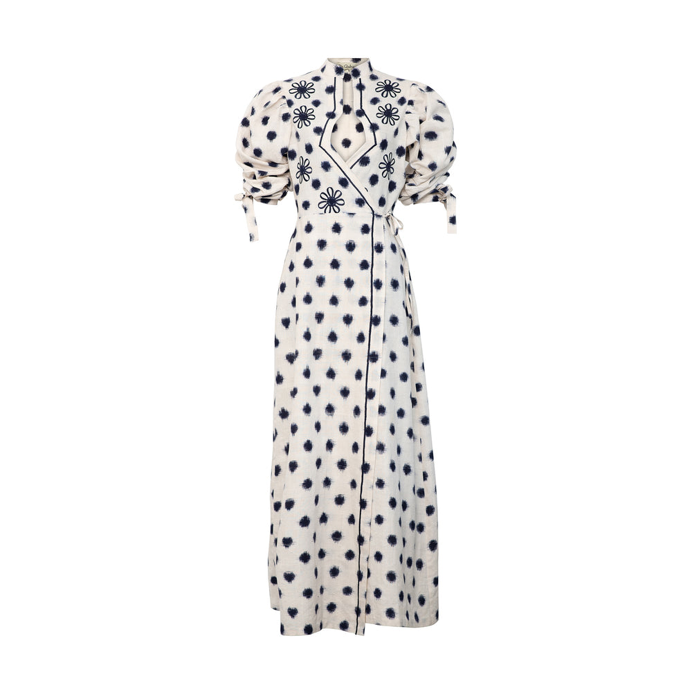 Front view of Campo Dress showcasing wrap style, flower embroidery, polka dot print, and gathered puff sleeves