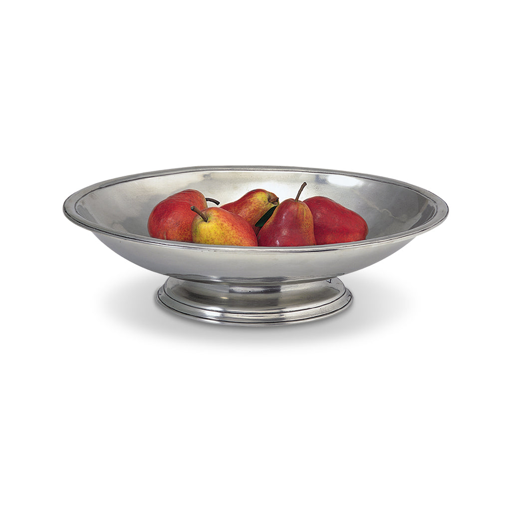 Front view of Oval Footed Centerpiece showcasing its footed oval pewter bowl with pears on a white background