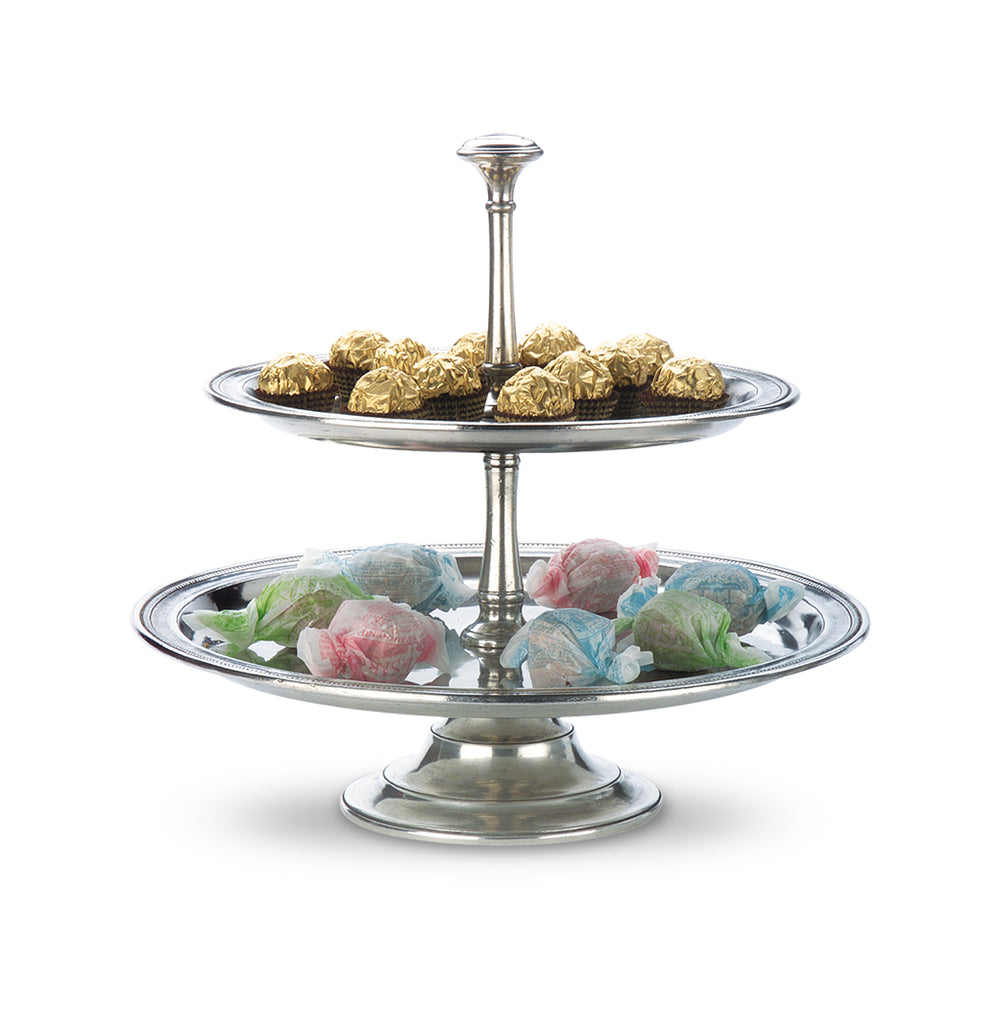 Front view of Toscana two-tier pewter centerpiece showcasing antique finish and two serving tiers on a white background