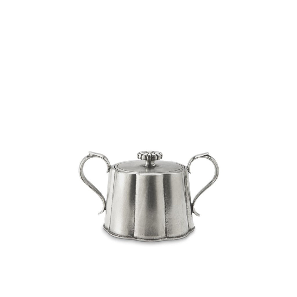Front view of Britannia Sugar Bowl showcasing a lidded pewter design and curved handles with a white background