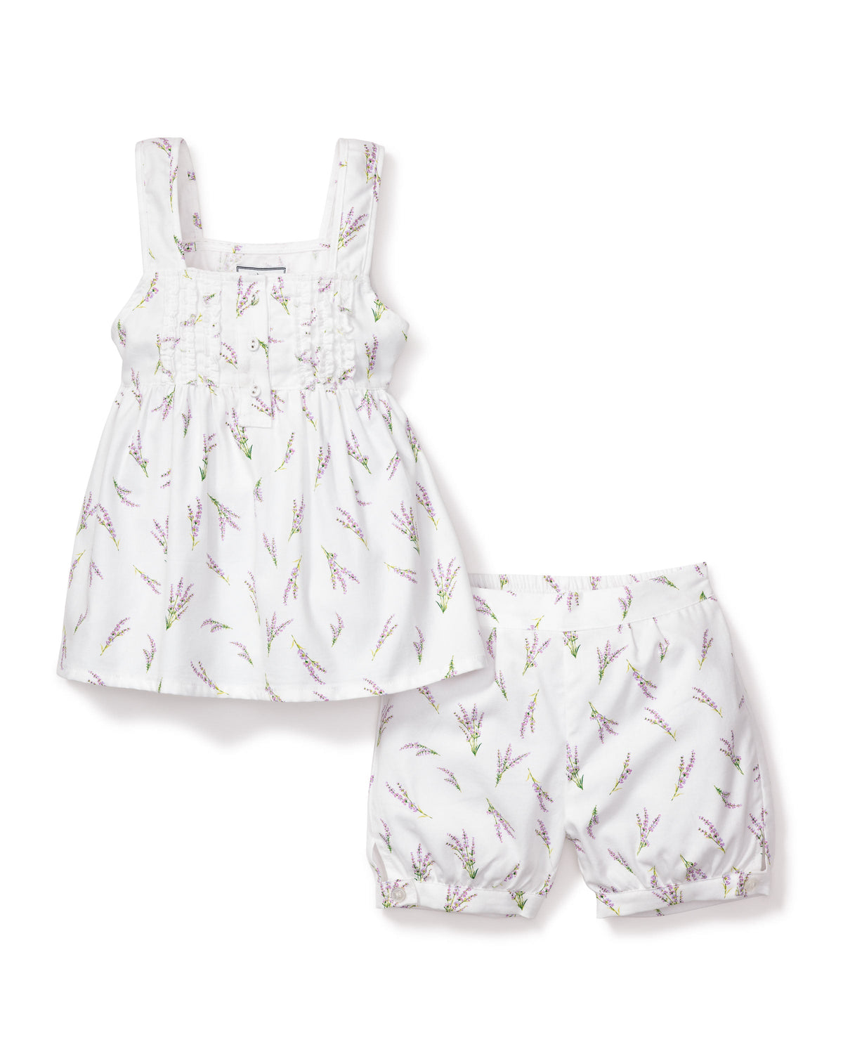 Flat-lay of Charlotte short set with lavender sprig print, ruffled placket top and elastic‑cuff bloomers on white background