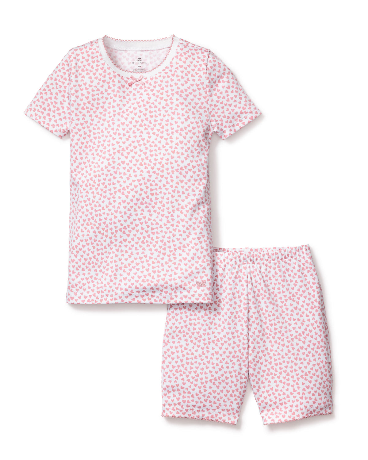 Flat lay of Children’s Sweethearts Pima Cotton Snug Fit Short Set with pink heart print and cute neck trim on white background