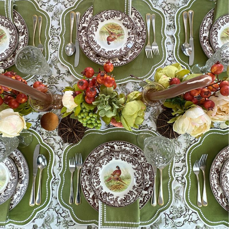 Sage placemat with white embroidery and matching napkin