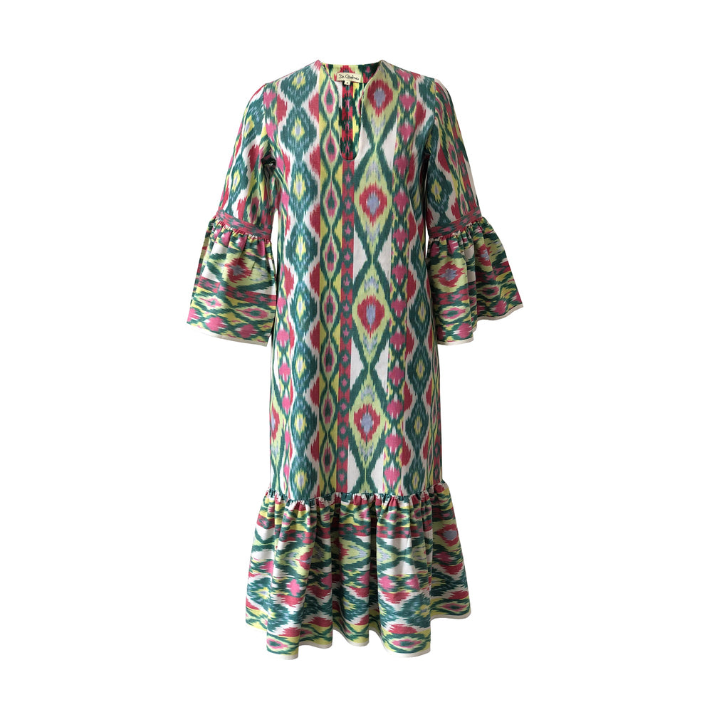 Front view of Viento de Primavera dress showcasing handwoven multicolor print, flounce sleeves, and long hemline on white