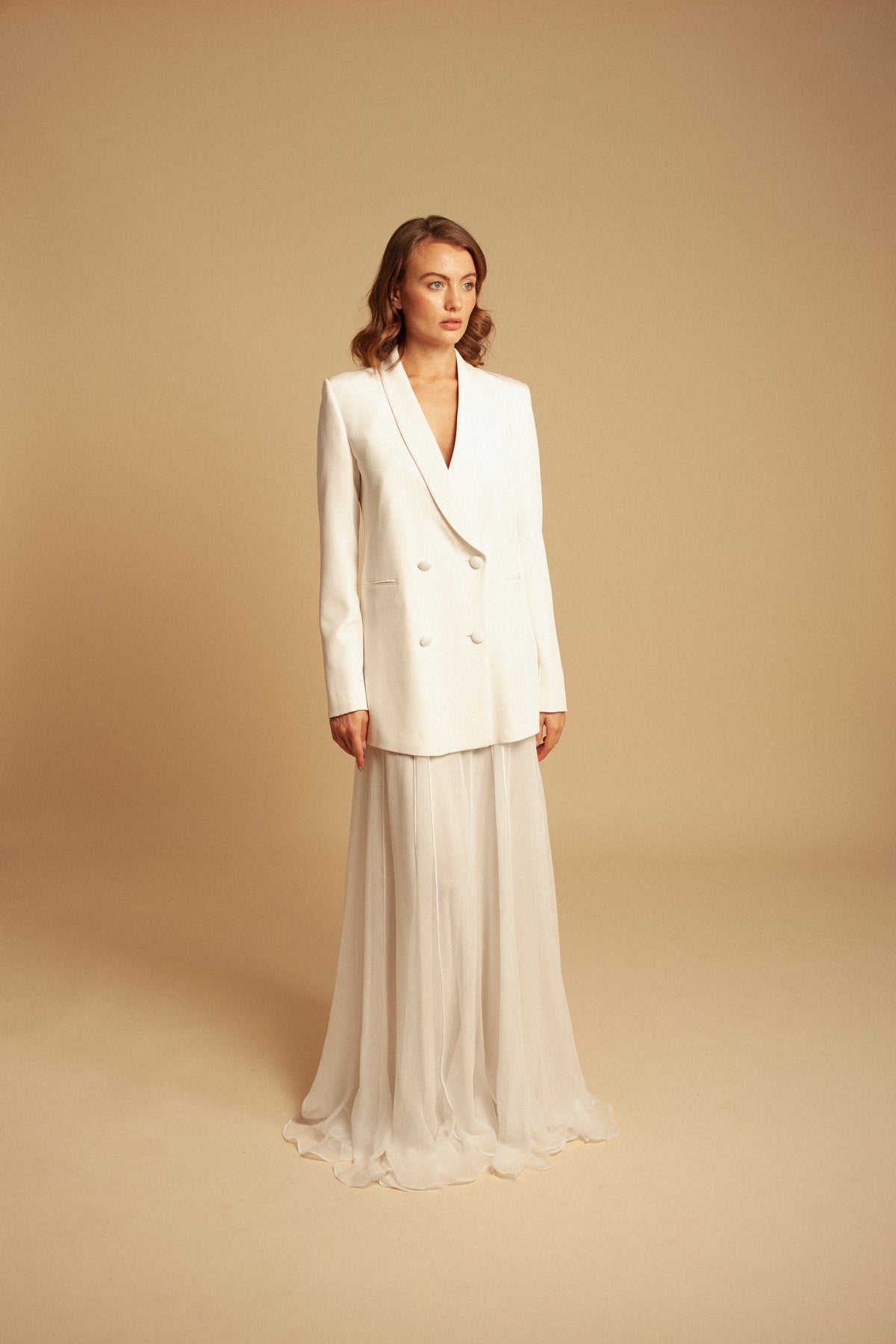Front view of Carmela Blazer showcasing four-button double-breasted closure with neutral studio background