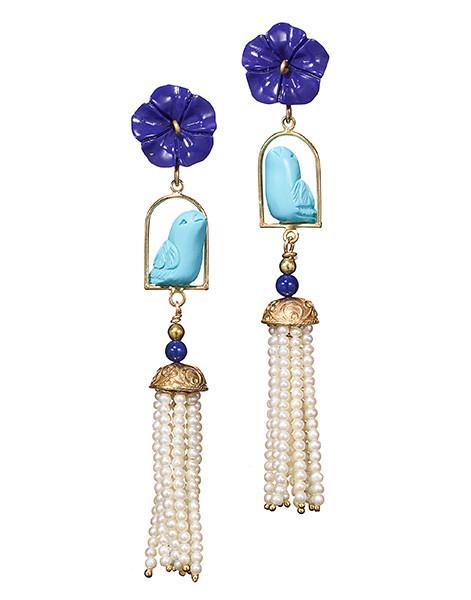 Front view of Swingers Earrings showcasing purple lapis flowers, turquoise birds, and pearl tassels on a white background