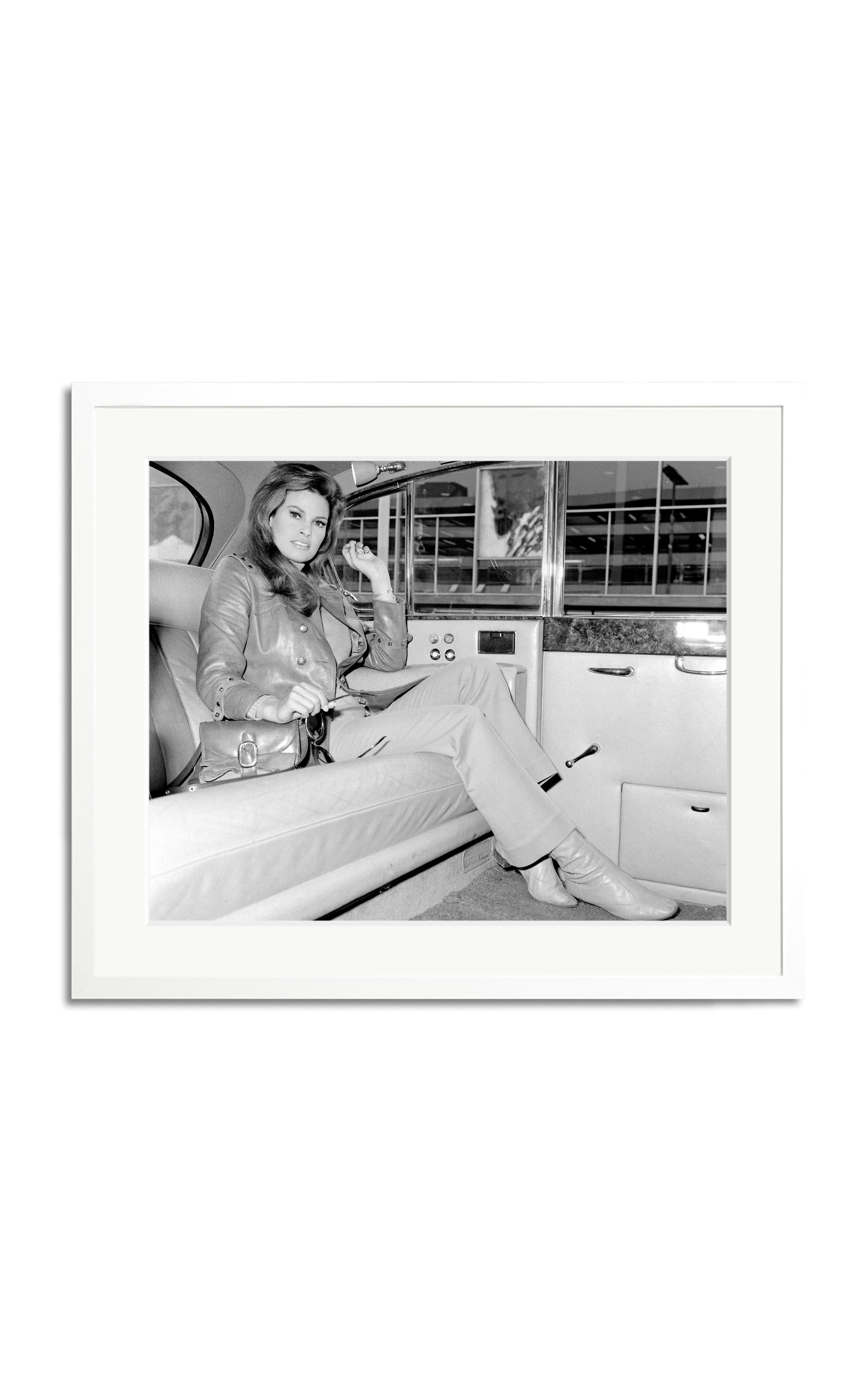 Welch arrives at Heathrow Airport Framed Photography Print