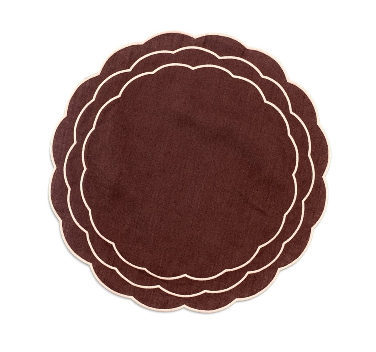 Top view of Sofia linen brown placemat showcasing blooming dahlia hand embroidery and scalloped edges on a white background