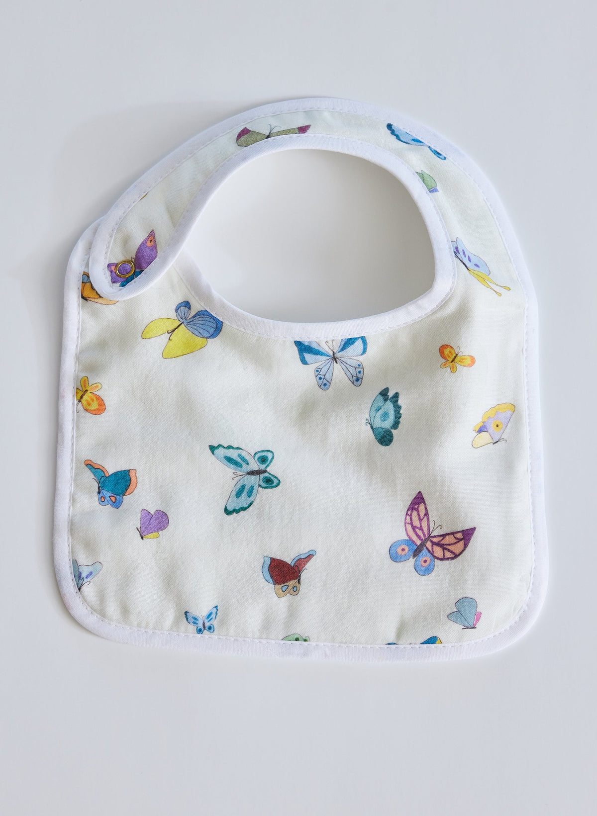 Front view of Madame Butterfly Bib and Burp Cloth Set showcasing colorful butterfly print with a white background
