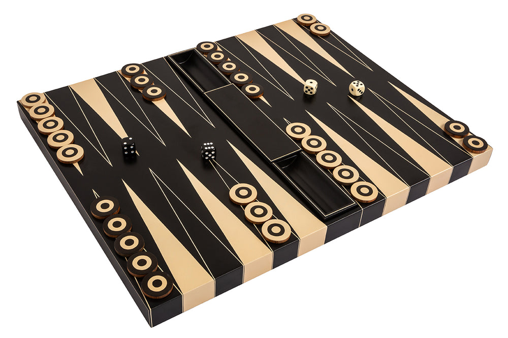 Angled view of Duo Backgammon Set showing black and natural wood board, layered round checkers, and two dice on white background