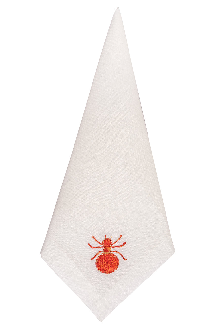 Folded view of Hormiga linen table napkin showcasing hand-embroidered red ant motif on white background
