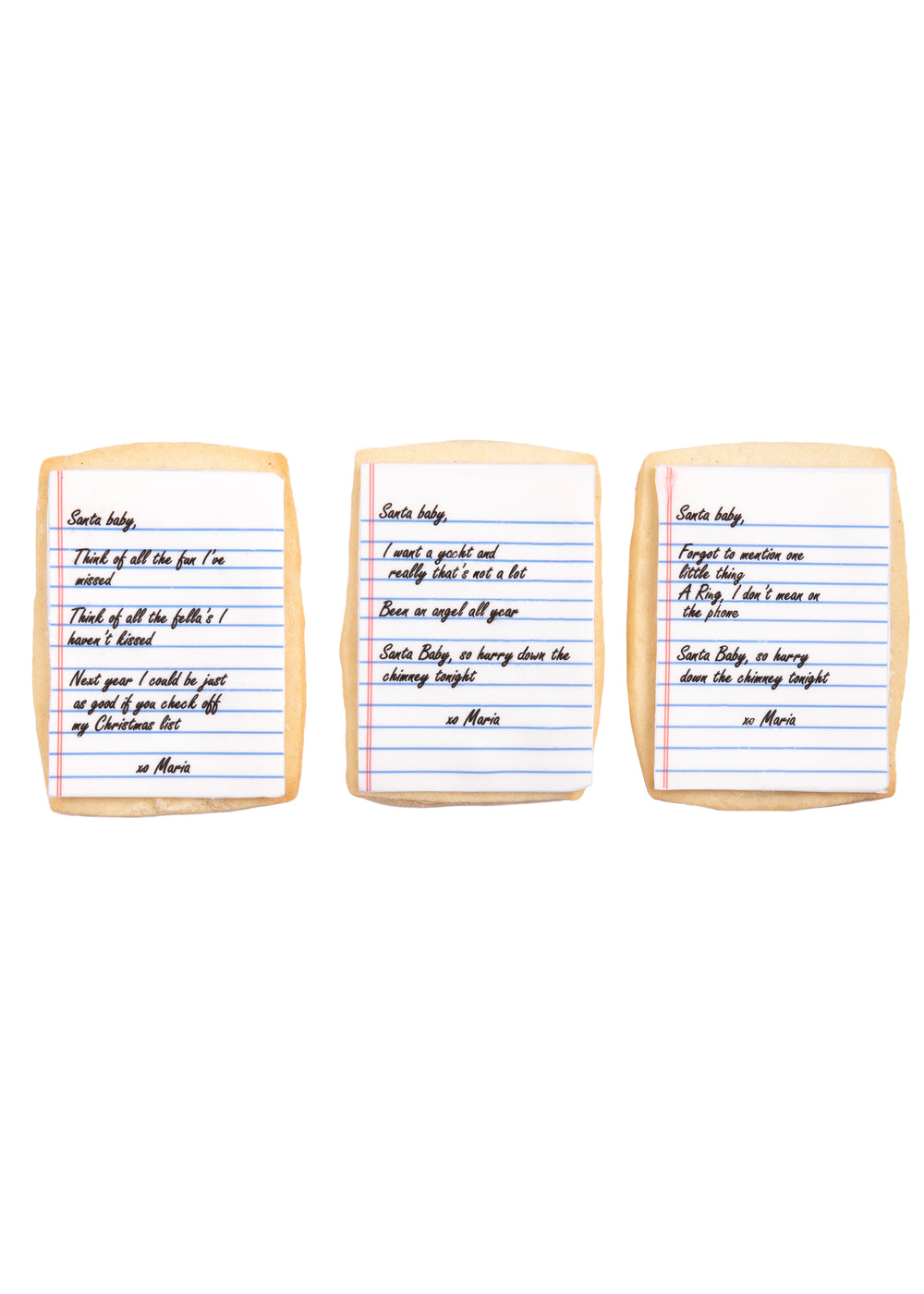 Front view of Santa Baby sugar cookies showcasing edible notebook-paper icing printed with song lyrics on a white background
