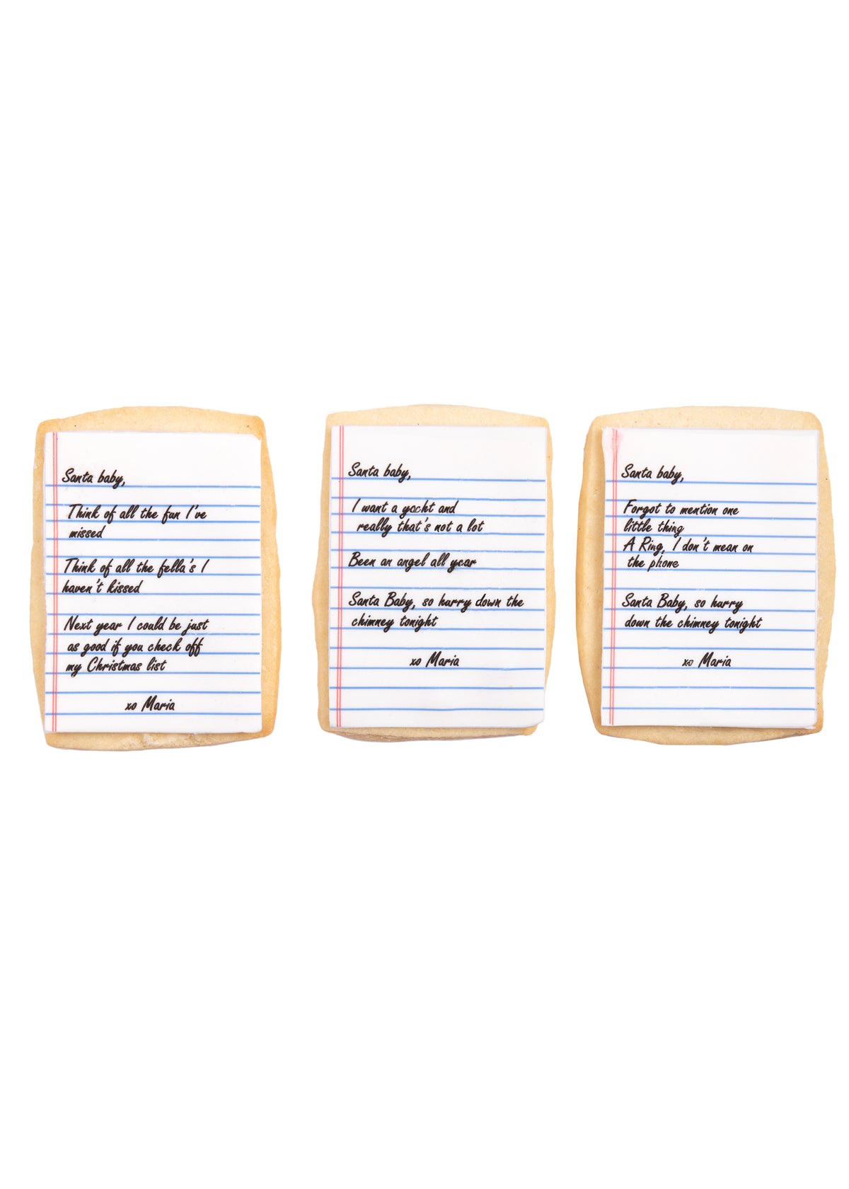 Front view of Santa Baby sugar cookies showcasing edible notebook-paper icing printed with song lyrics on a white background
