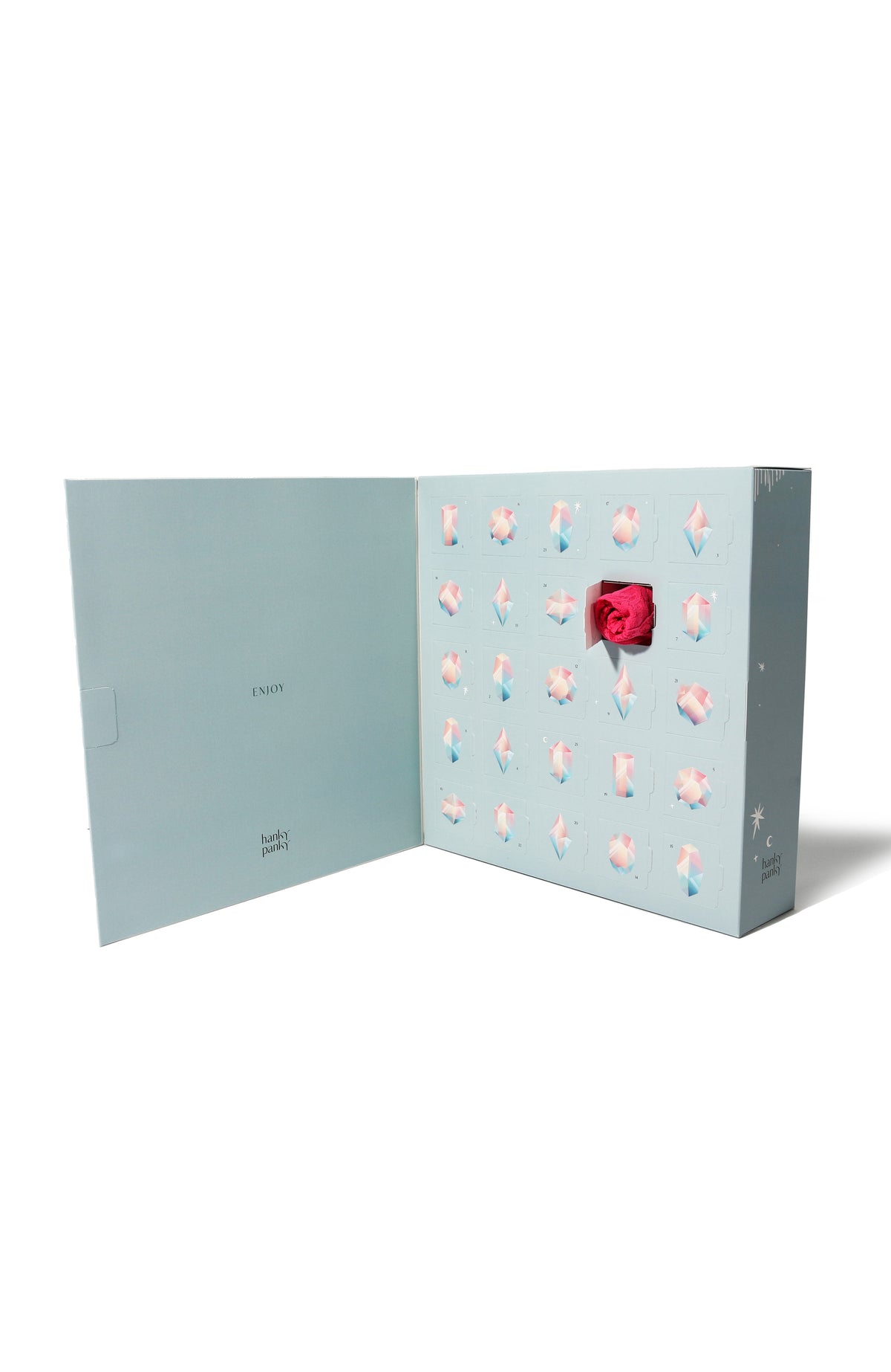 Open view of 25 Original Rise Thong Advent Calendar showcasing numbered doors and a pink stretch lace thong on a white background