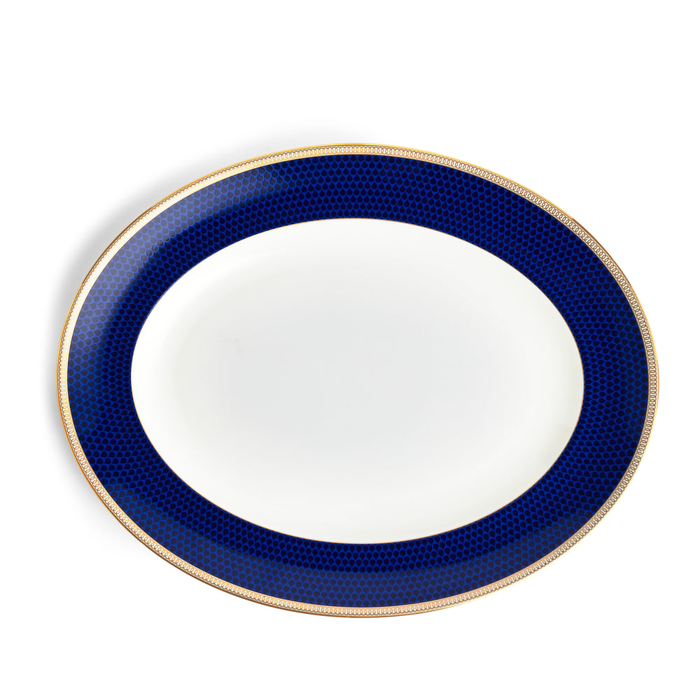 Front view of Wedgwood Hibiscus Oval Platter showcasing blue textured edging and geometric pattern on white background