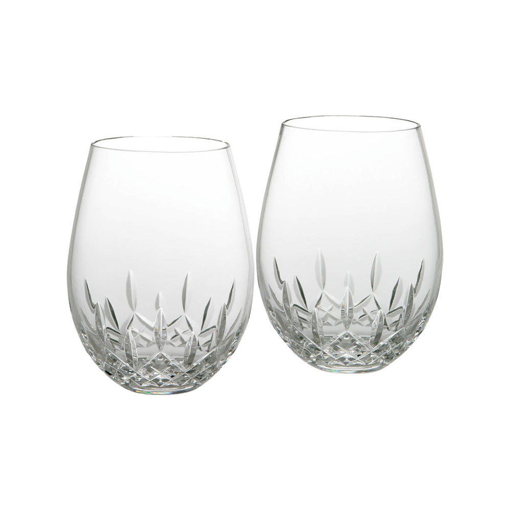 Front view of two Lismore Essence stemless wine glasses in clear crystal with wedge and diamond cuts on white