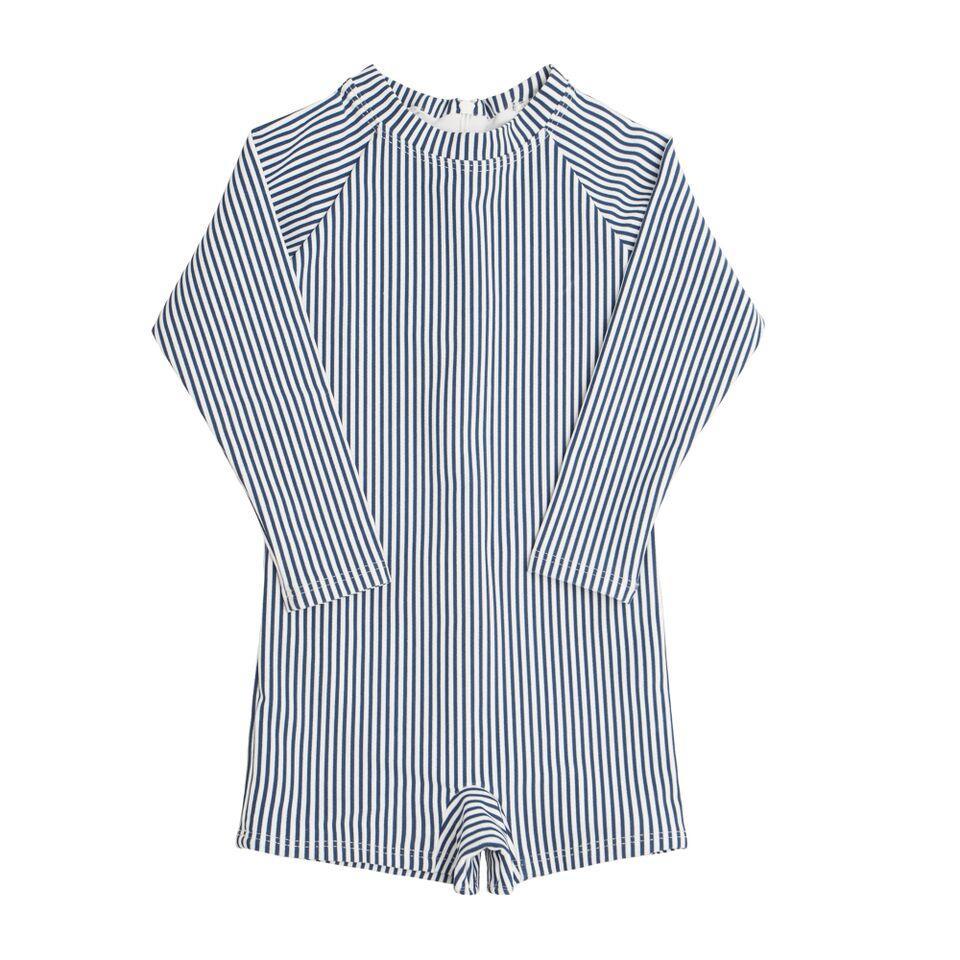 Front view of boys rashguard one-piece showcasing blue and white vertical stripes with long sleeves on a white background
