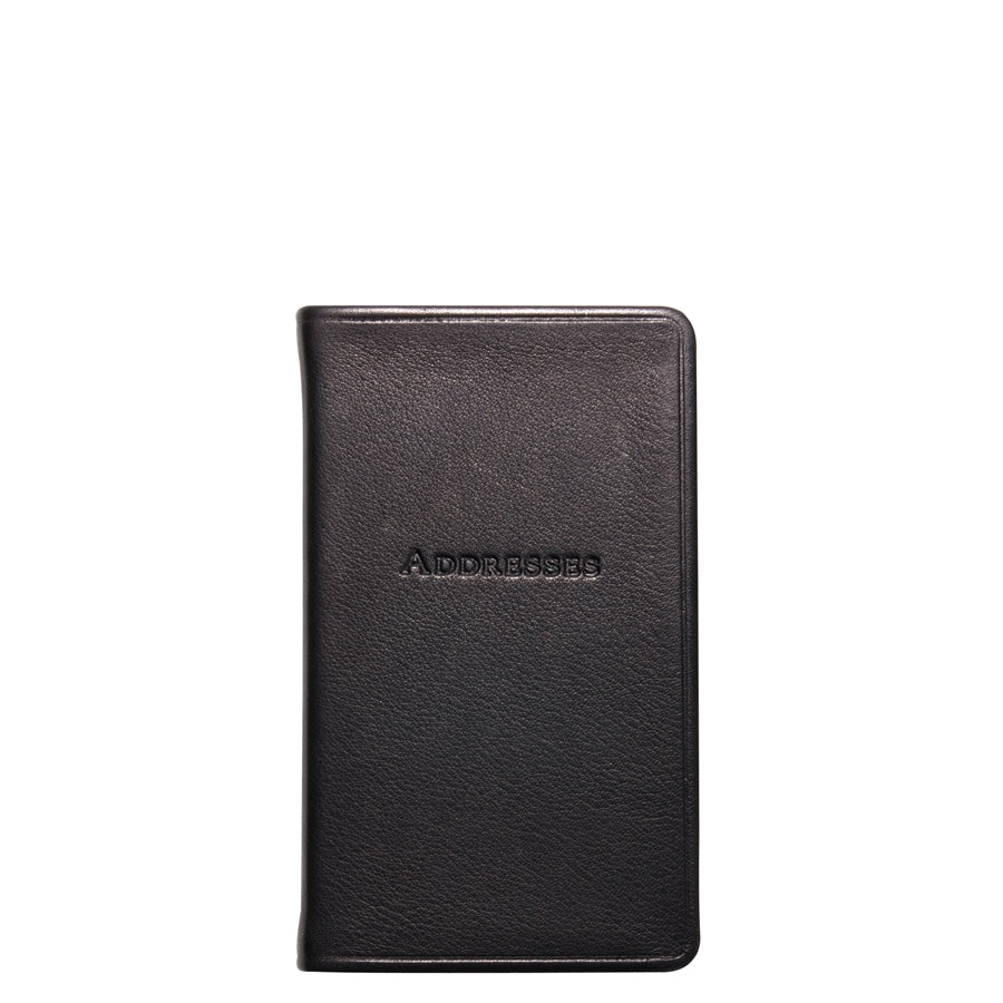 Front view of 5-inch pocket address book showing black pebbled leather cover embossed with ADDRESSES on white background