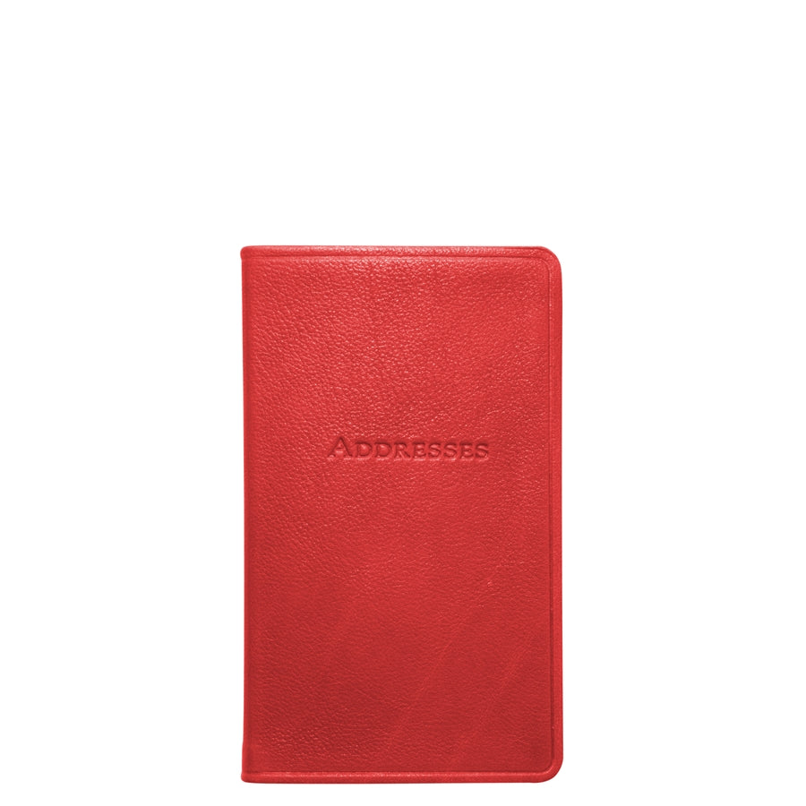 Front view of 5-inch pocket address book in red showcasing embossed “ADDRESSES” on textured leather cover on white background