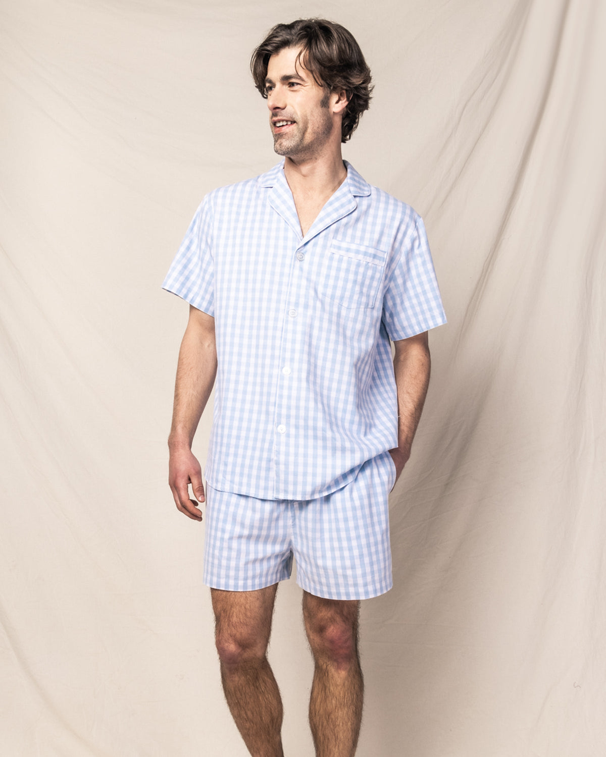 Front view of Men’s Light Blue Gingham Short Set showcasing pearl buttons and contrast piping on a model against a neutral backdrop