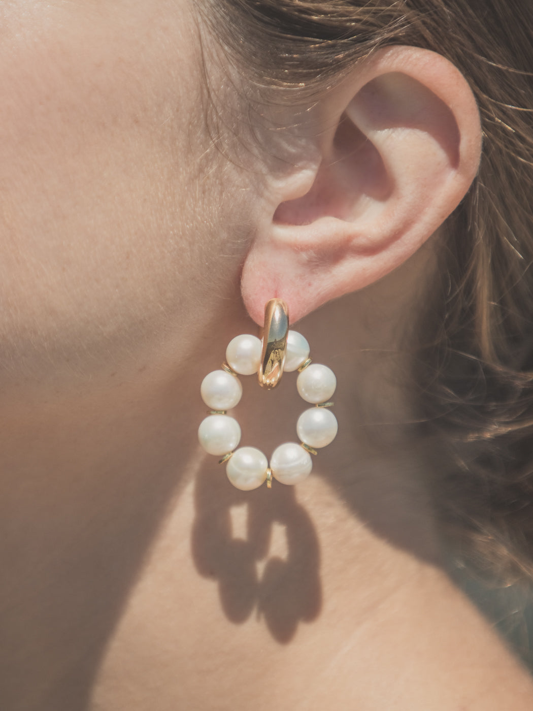 chunky gold hoop and pearl earrings