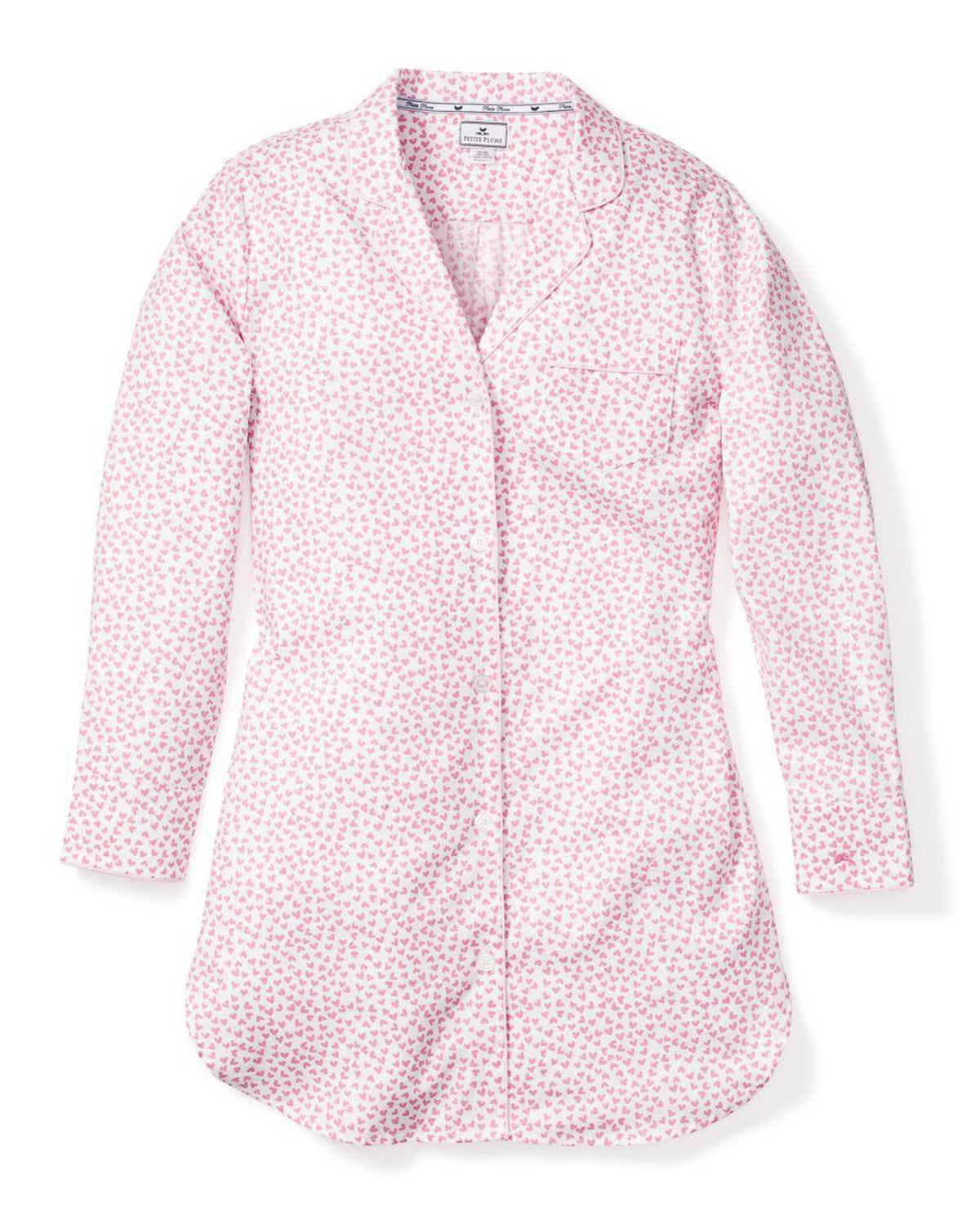 Flat lay of Sweethearts nightshirt showcasing pink all-over heart print, piped collar, and pearl buttons on white background
