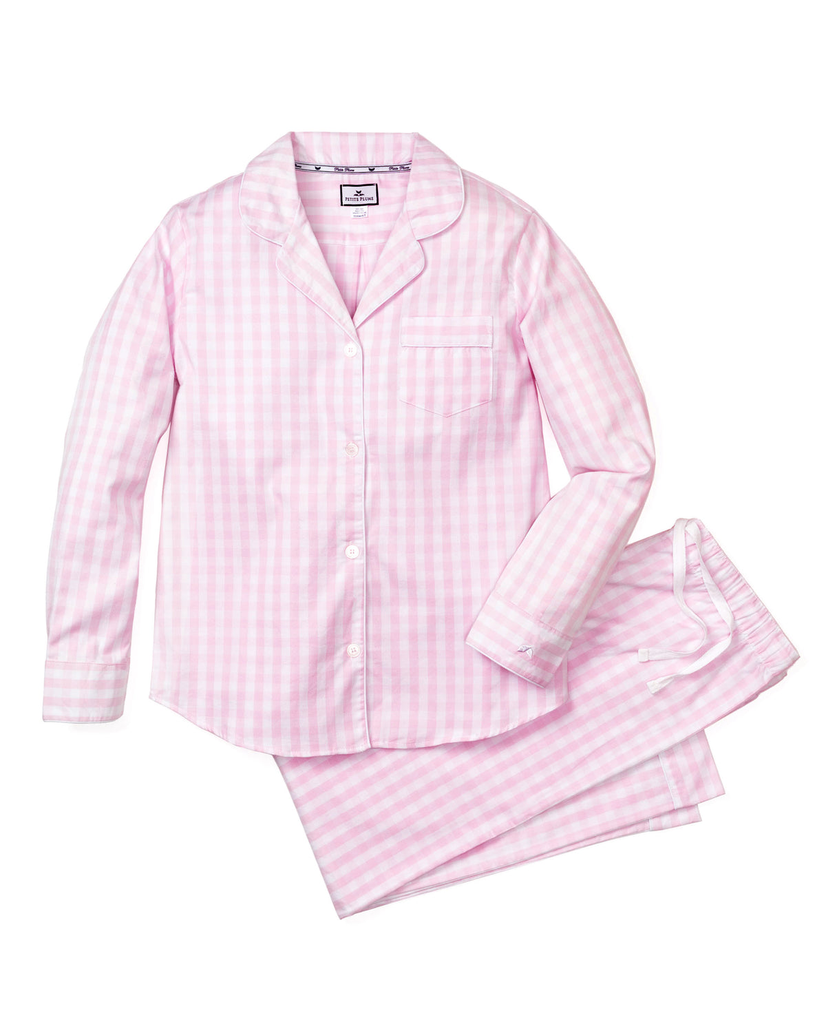 Front view of women’s pink gingham pajama set showcasing a collared button-front top and matching pants on white