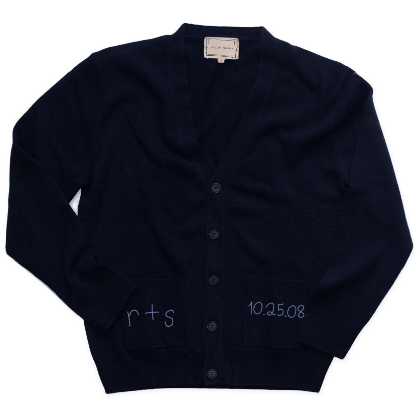Front of navy Anniversary Oversized Cardigan with button front and patch pockets embroidered r+s and 10.25.08