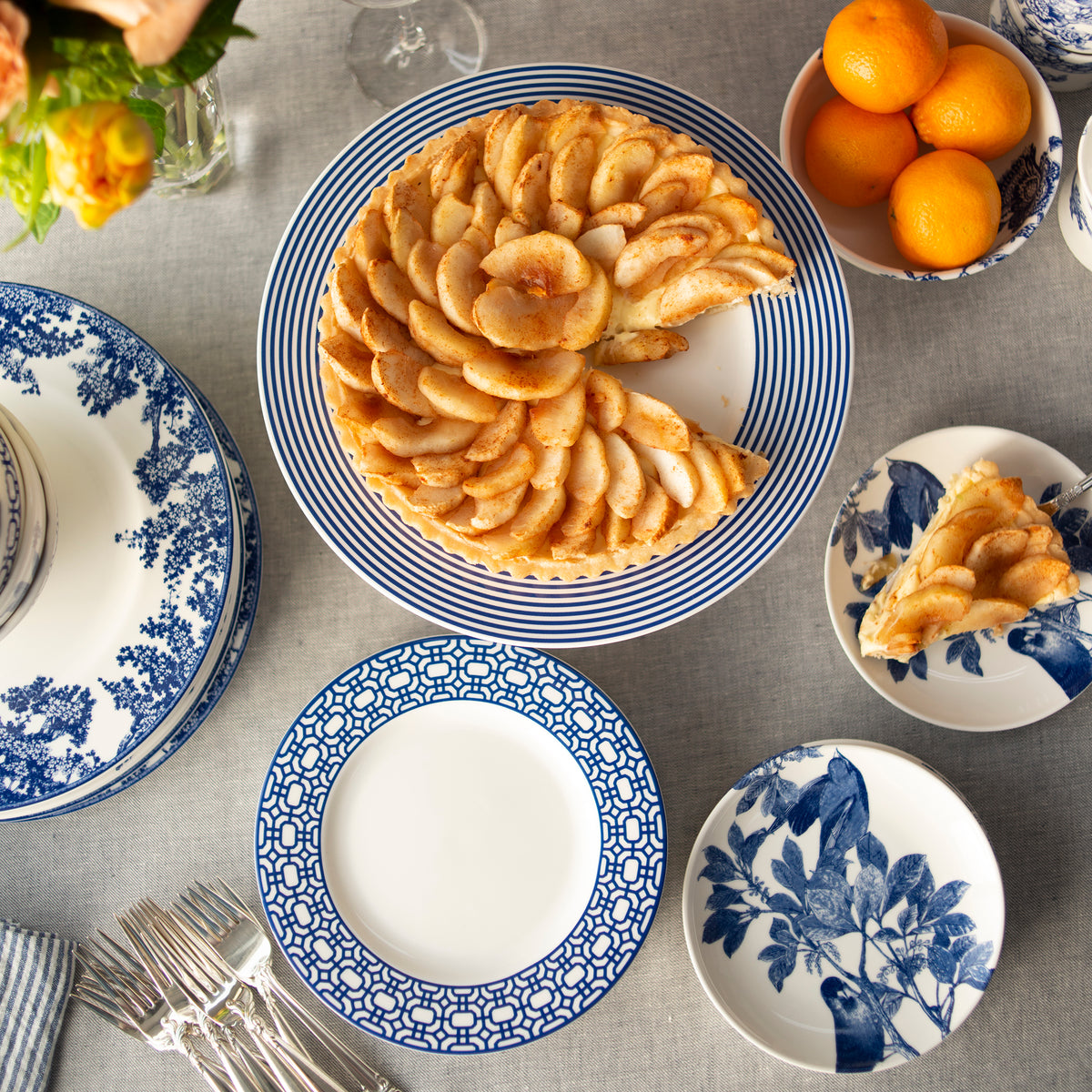 Apple galette served on a blue-and-white Newport Sushi Tray Large in a coordinated table setting